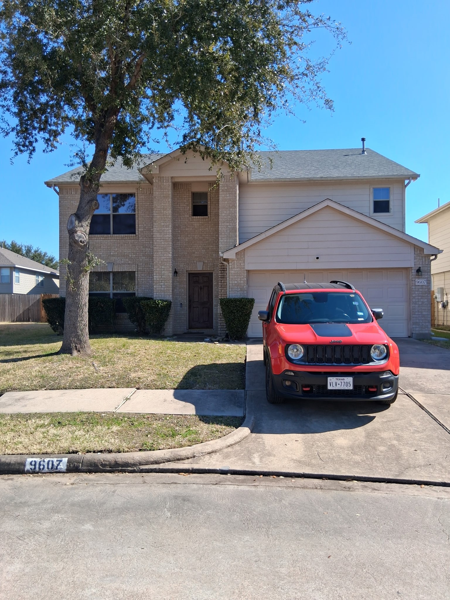 a car parked in front of a house
