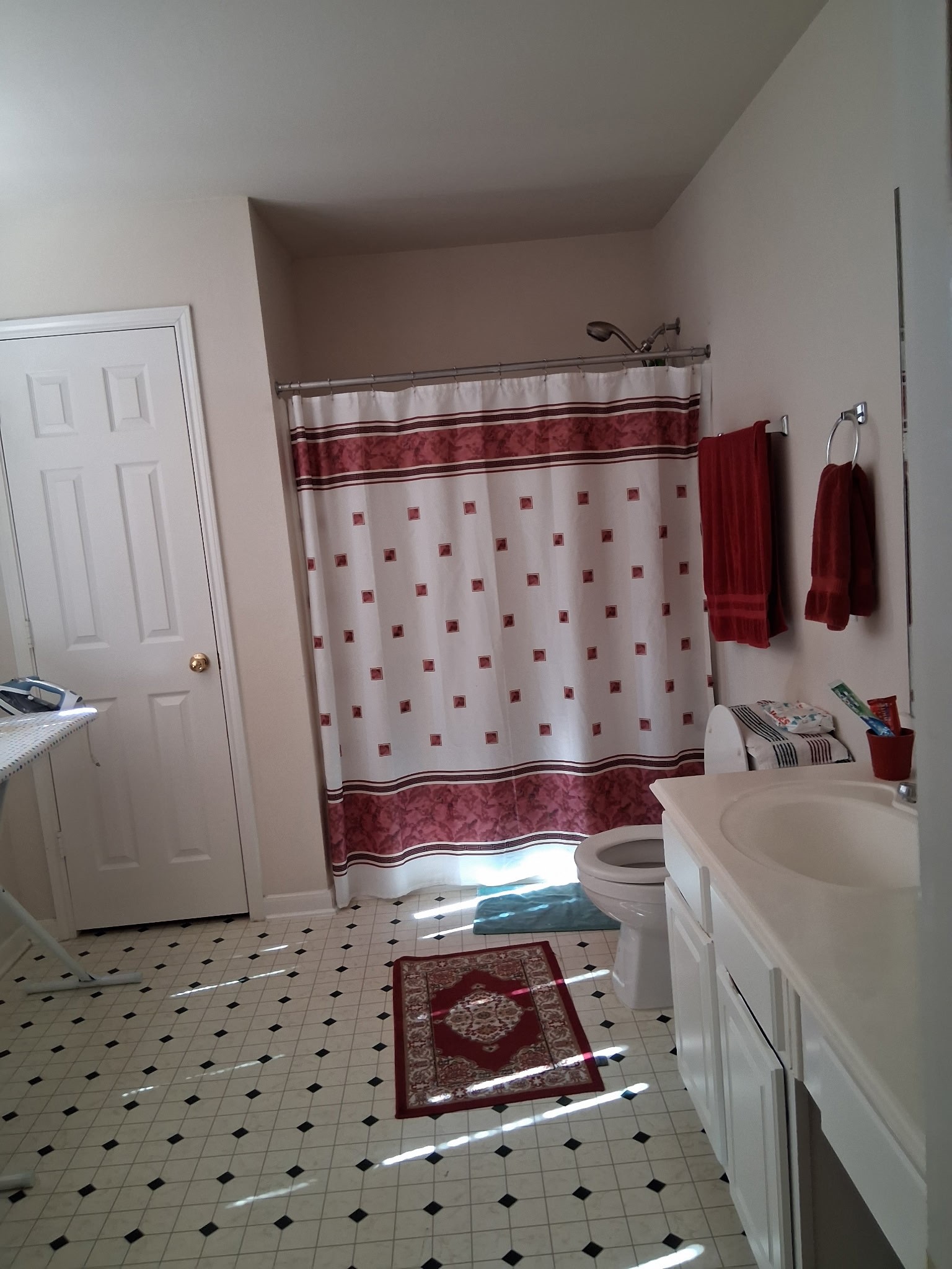 9607 Rads Point Sugar Land, TX 77498 - Photo 13 of 24 a bathroom with a sink and a mirror