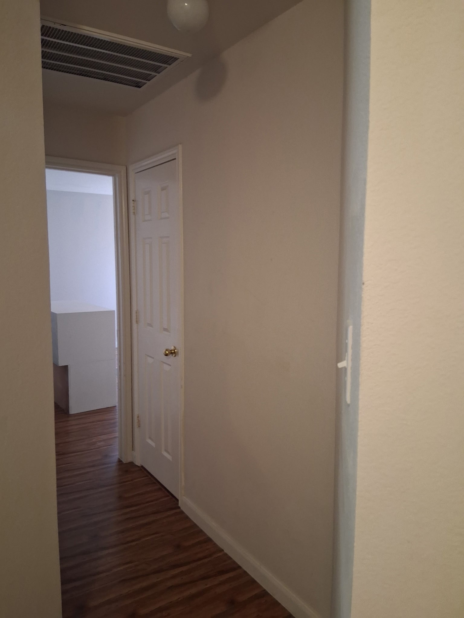 9607 Rads Point Sugar Land, TX 77498 - Photo 16 of 24 a view of a hallway with wooden floor