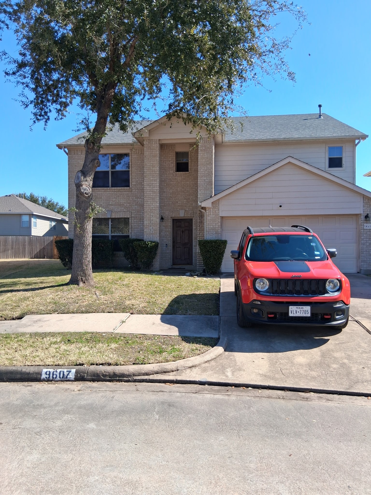 9607 Rads Point Sugar Land, TX 77498 - Photo 2 of 24 a car parked in front of a house