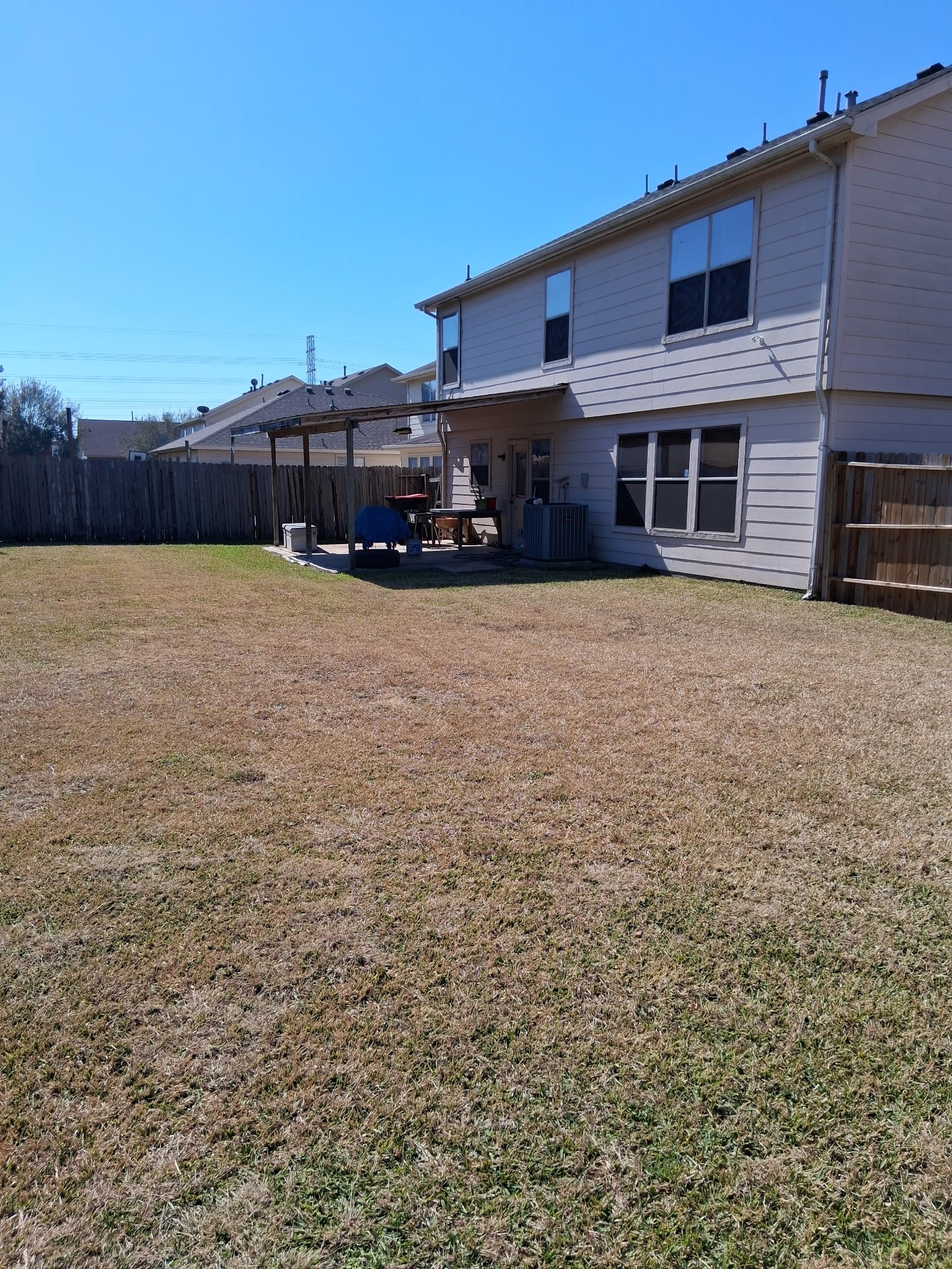 9607 Rads Point Sugar Land, TX 77498 - Photo 4 of 24 a view of a house with a yard