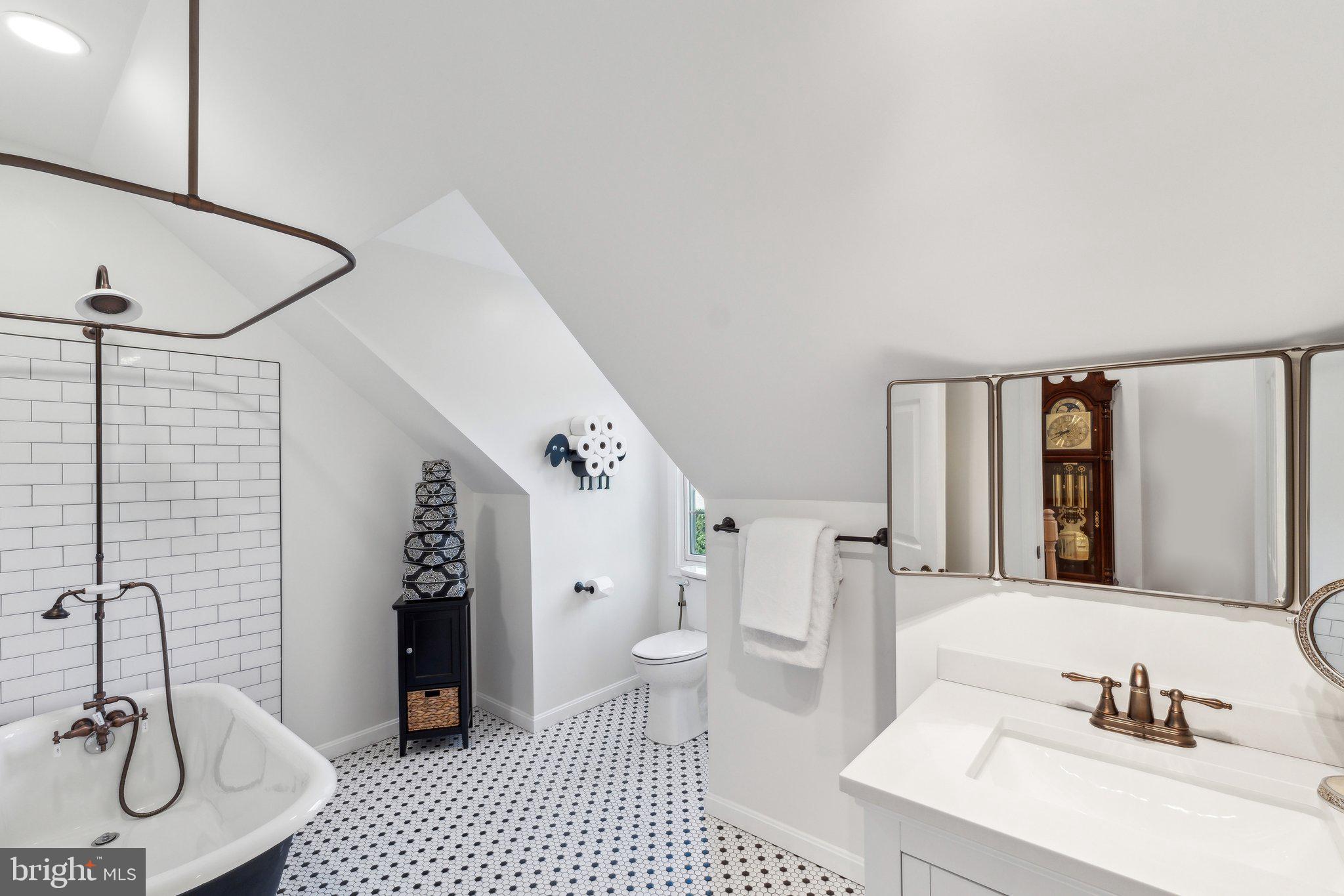 7401 Blair Road Northwest Washington, DC 20012 - Photo 32 of 42 a bathroom with a sink toilet and shower