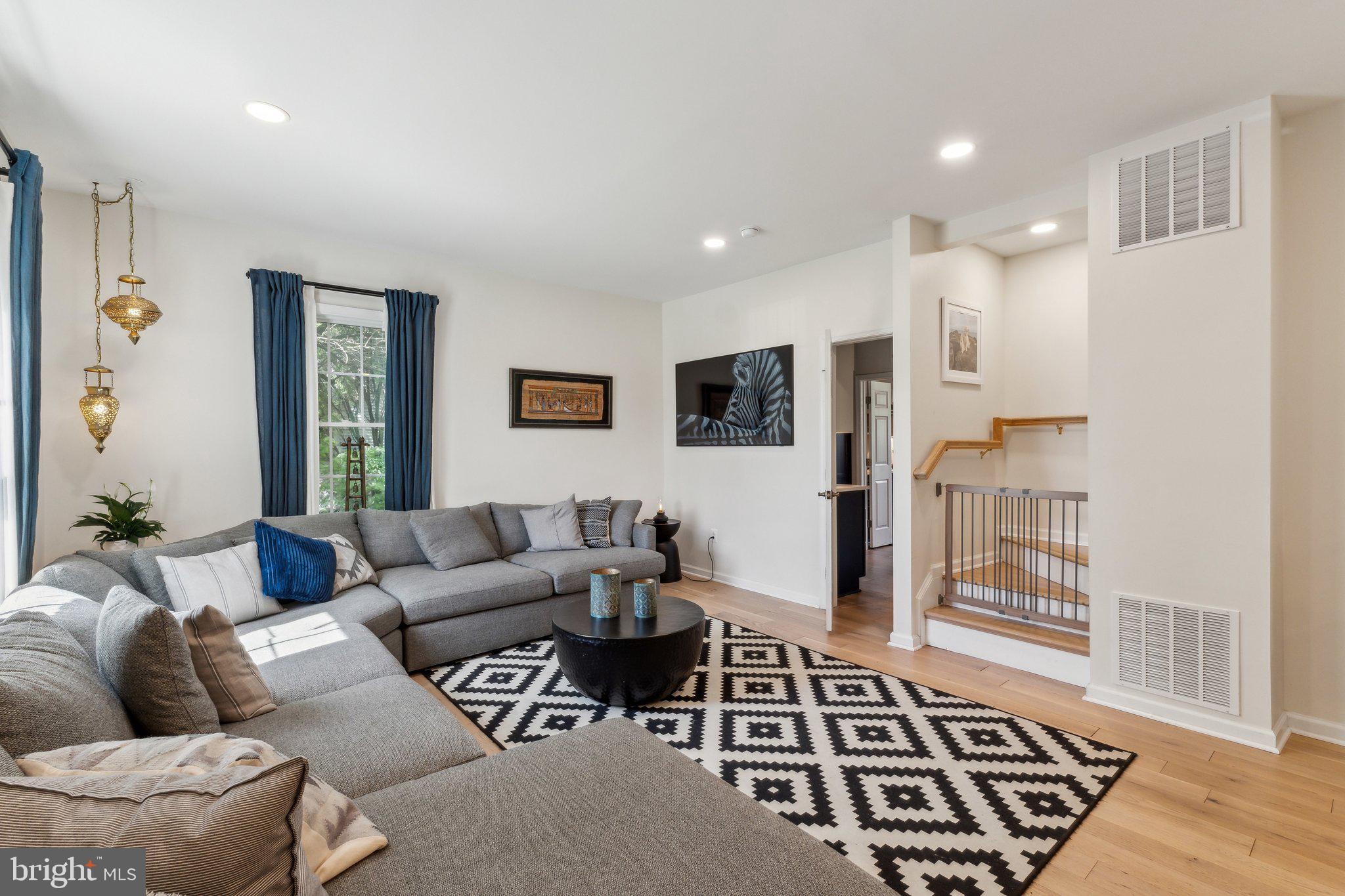 7401 Blair Road Northwest Washington, DC 20012 - Photo 5 of 42 a living room with furniture and a rug