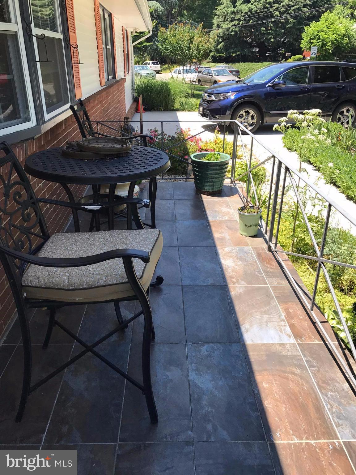 2714 Hughes Road Adelphi, MD 20783 - Photo 15 of 15 a view of a chairs and table in the balcony