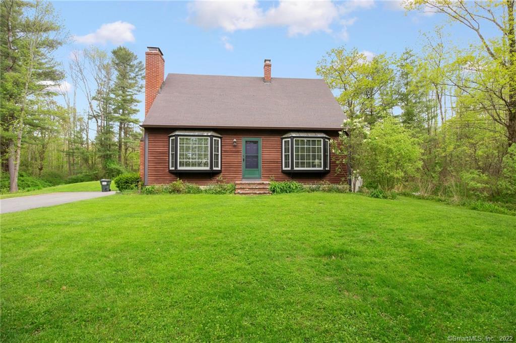32 Potash Road Litchfield, CT 06759 - Photo 1 of 1 a brick house with a yard in front of it