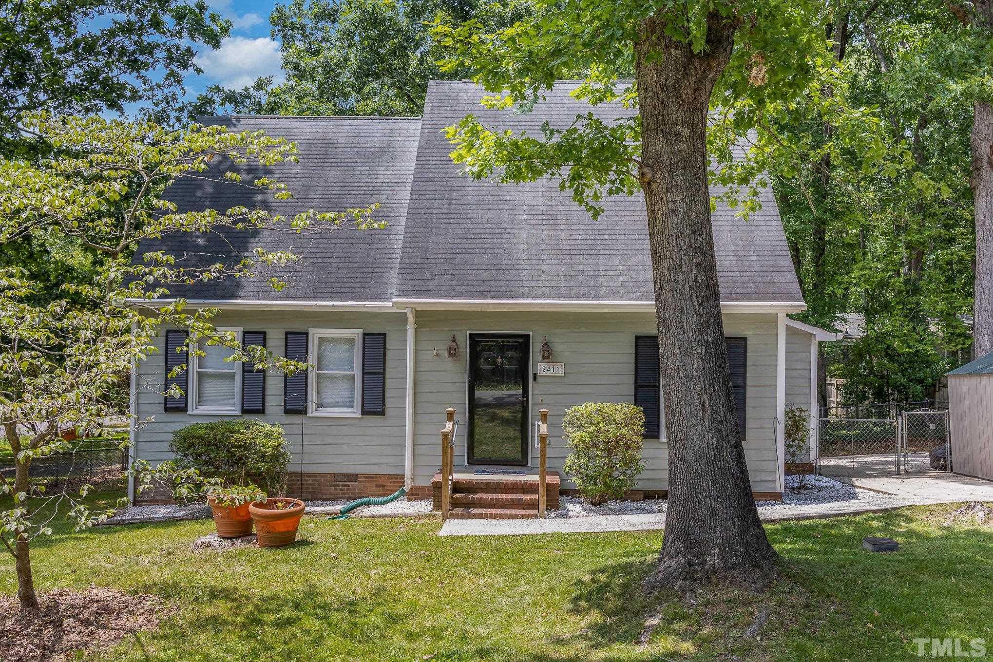 front view of a house with a yard