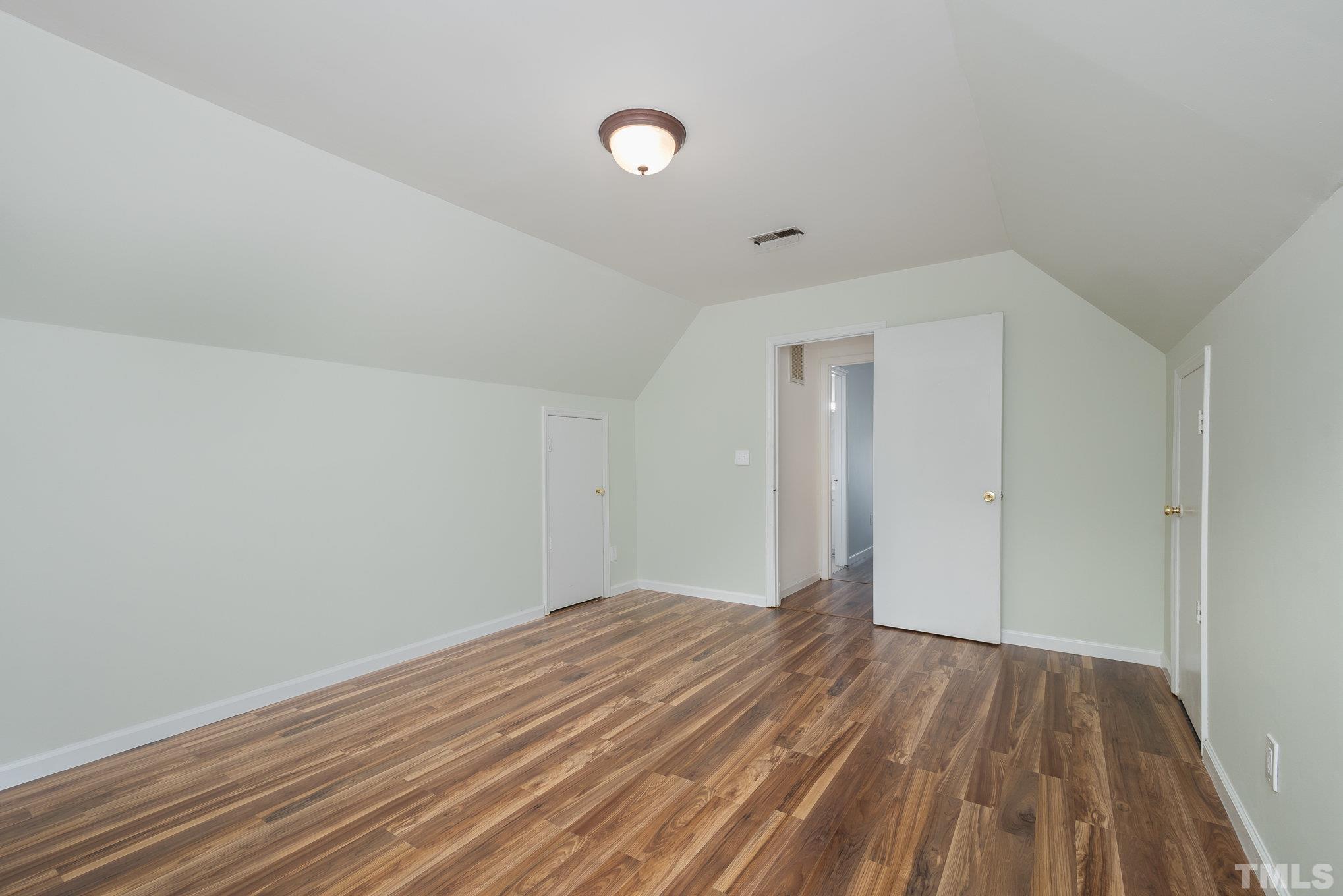 2411 Wade Hampton Road Hillsborough, NC 27278 - Photo 15 of 21 a view of room with wooden floor