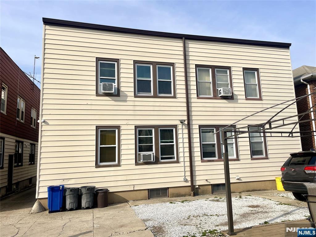 743 Hamilton Street, Unit 2 Harrison, NJ 07029 - Photo 2 of 2 a view of a house with a patio