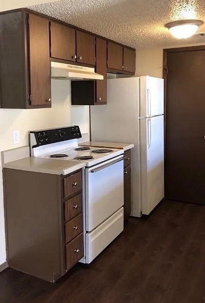 4504 Hunt Circle Killeen, TX 76543 - Photo 4 of 9 a kitchen with metallic refrigerator and a stove