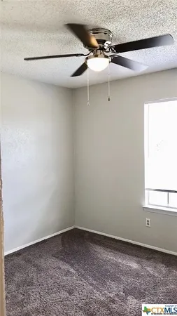 a view of a window in an empty room