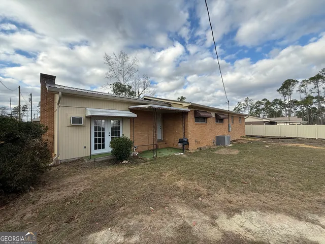 a view of a house with a patio