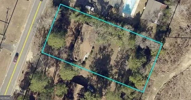 a view of a forest from a balcony