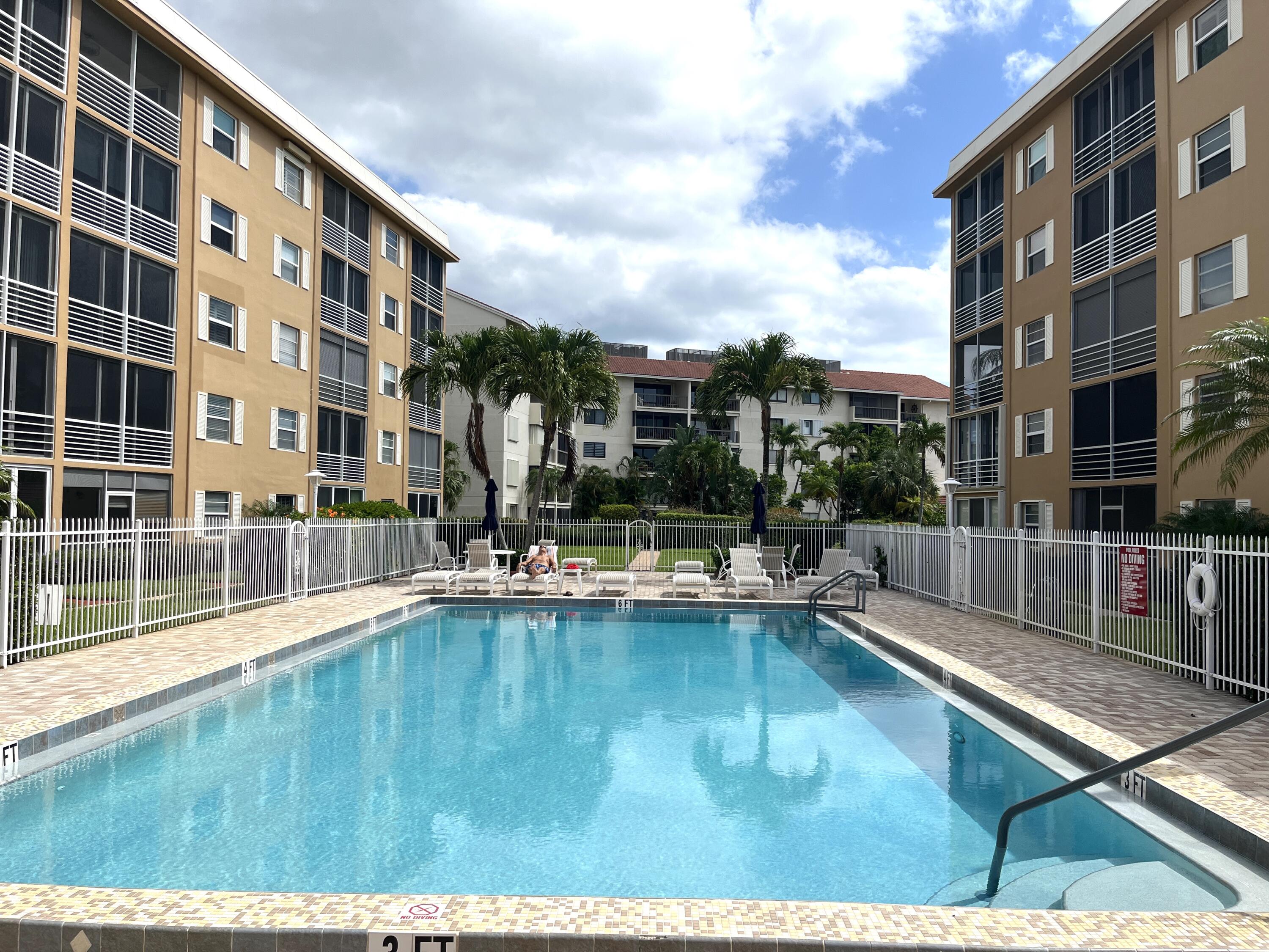 308 Golfview Road, Unit 107 North Palm Beach, FL 33408 - Photo 21 of 34 Time to jump to the pool!