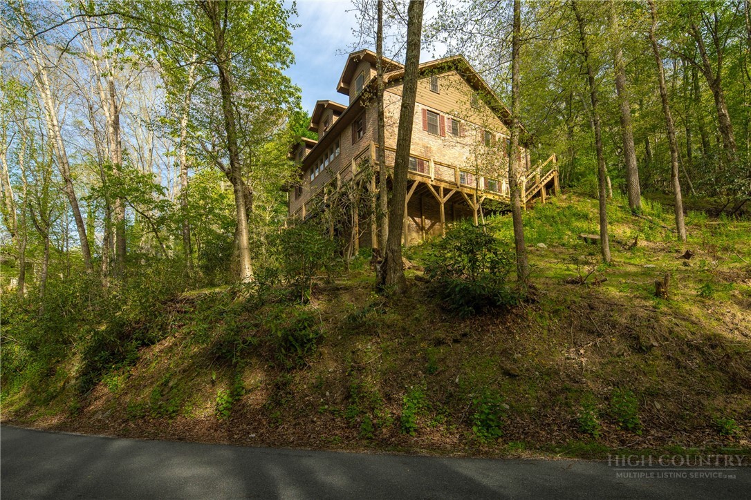 239 Eagle Drive Boone, NC 28607 - Photo 2 of 41 a view of a pathway of a house
