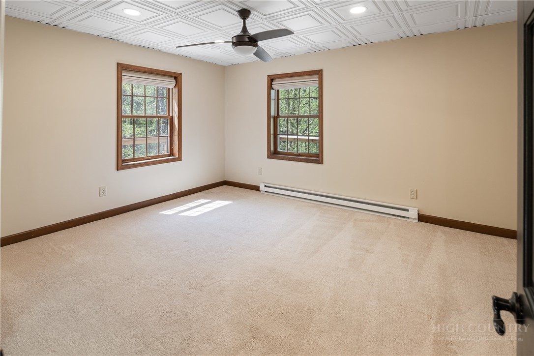 239 Eagle Drive Boone, NC 28607 - Photo 28 of 41 a view of an empty room with a window