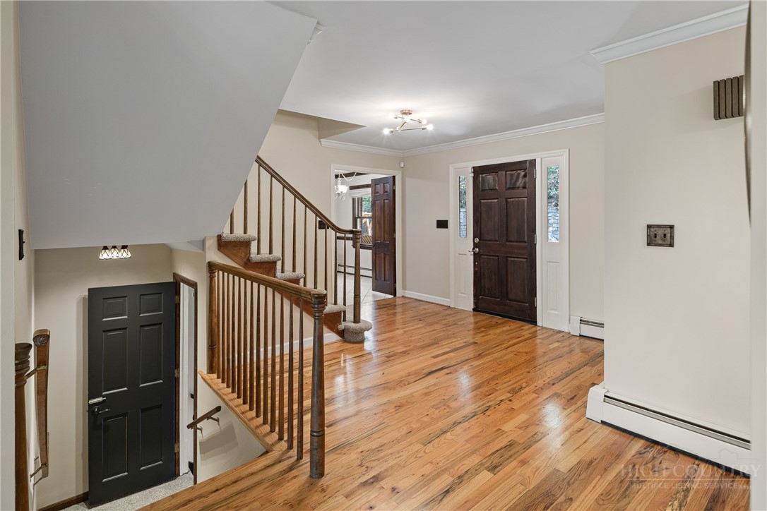 239 Eagle Drive Boone, NC 28607 - Photo 5 of 41 a view of entryway with wooden floor