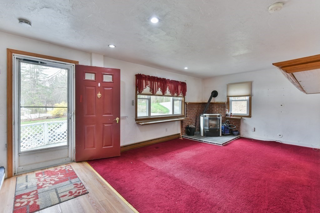 136 Pierpont Road Dudley, MA 01571 - Photo 13 of 28 wooden floor and windows in a room