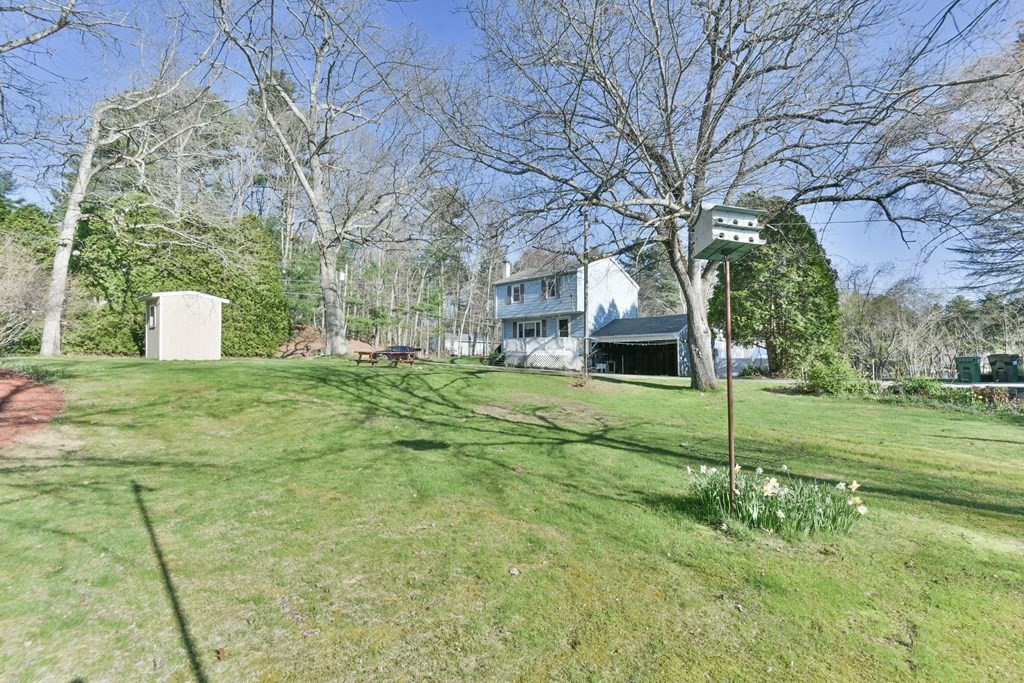 136 Pierpont Road Dudley, MA 01571 - Photo 5 of 28 a house view with a garden space