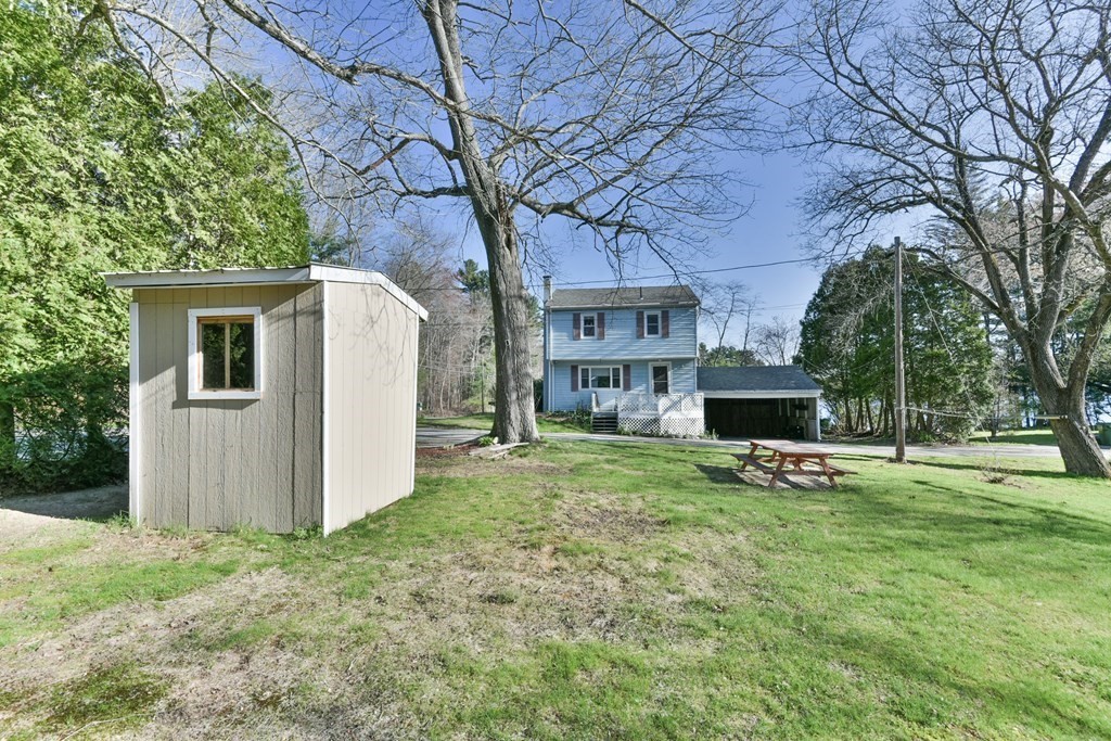 136 Pierpont Road Dudley, MA 01571 - Photo 6 of 28 a view of a house with backyard and a tree