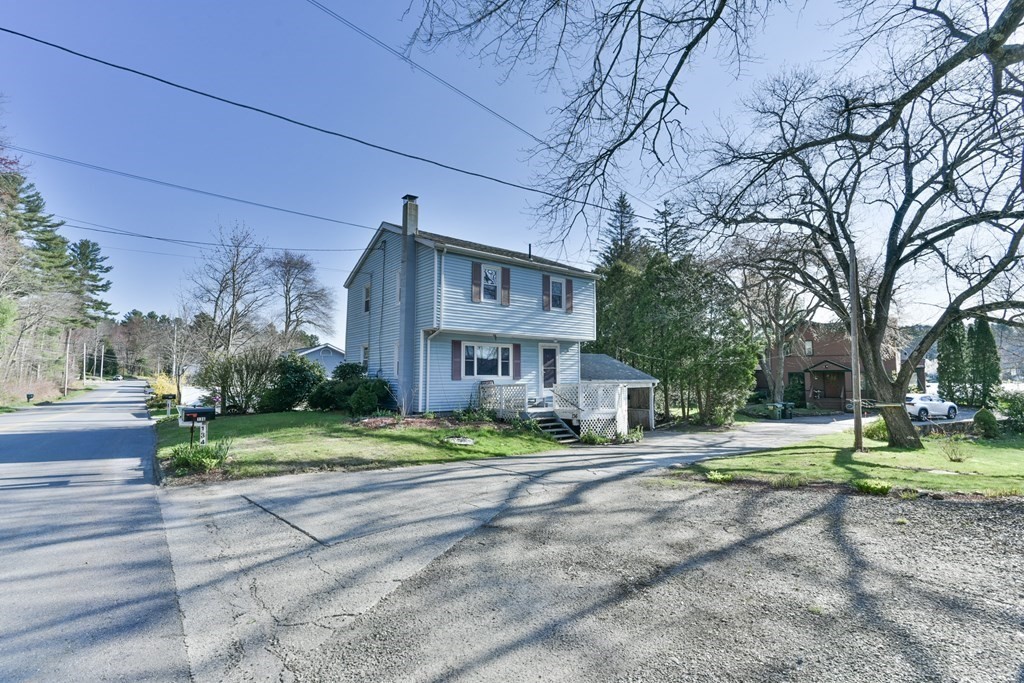 136 Pierpont Road Dudley, MA 01571 - Photo 7 of 28 a view of residential houses with yard and road