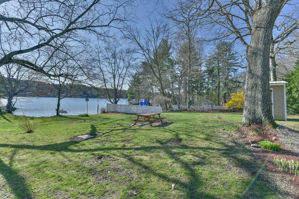 136 Pierpont Road Dudley, MA 01571 - Photo 9 of 28 a backyard of a house with lots of green space