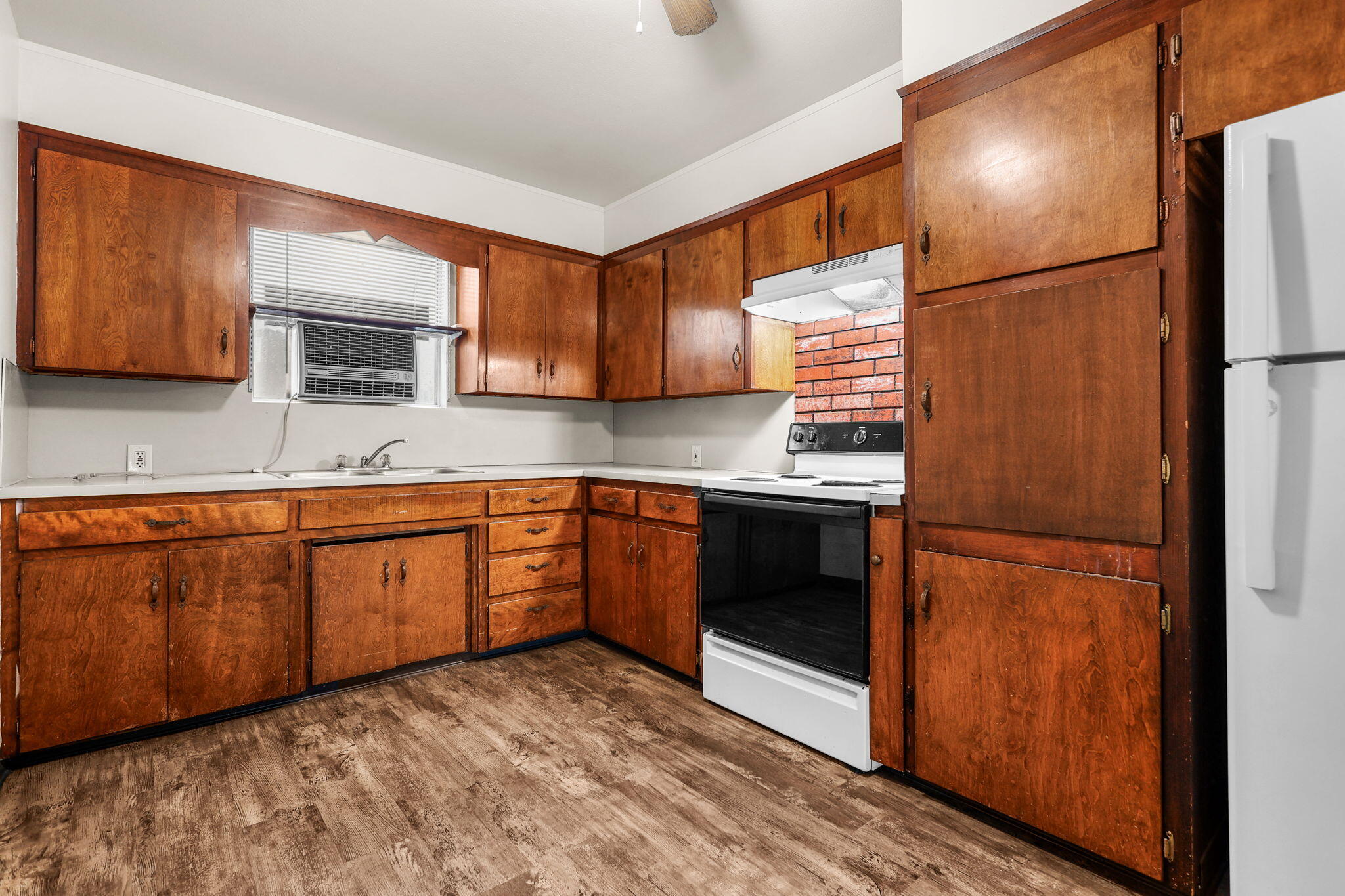 3200 Franklin Street Anderson, CA 96007 - Photo 11 of 35 a kitchen with stainless steel appliances granite countertop a refrigerator a sink and a stove