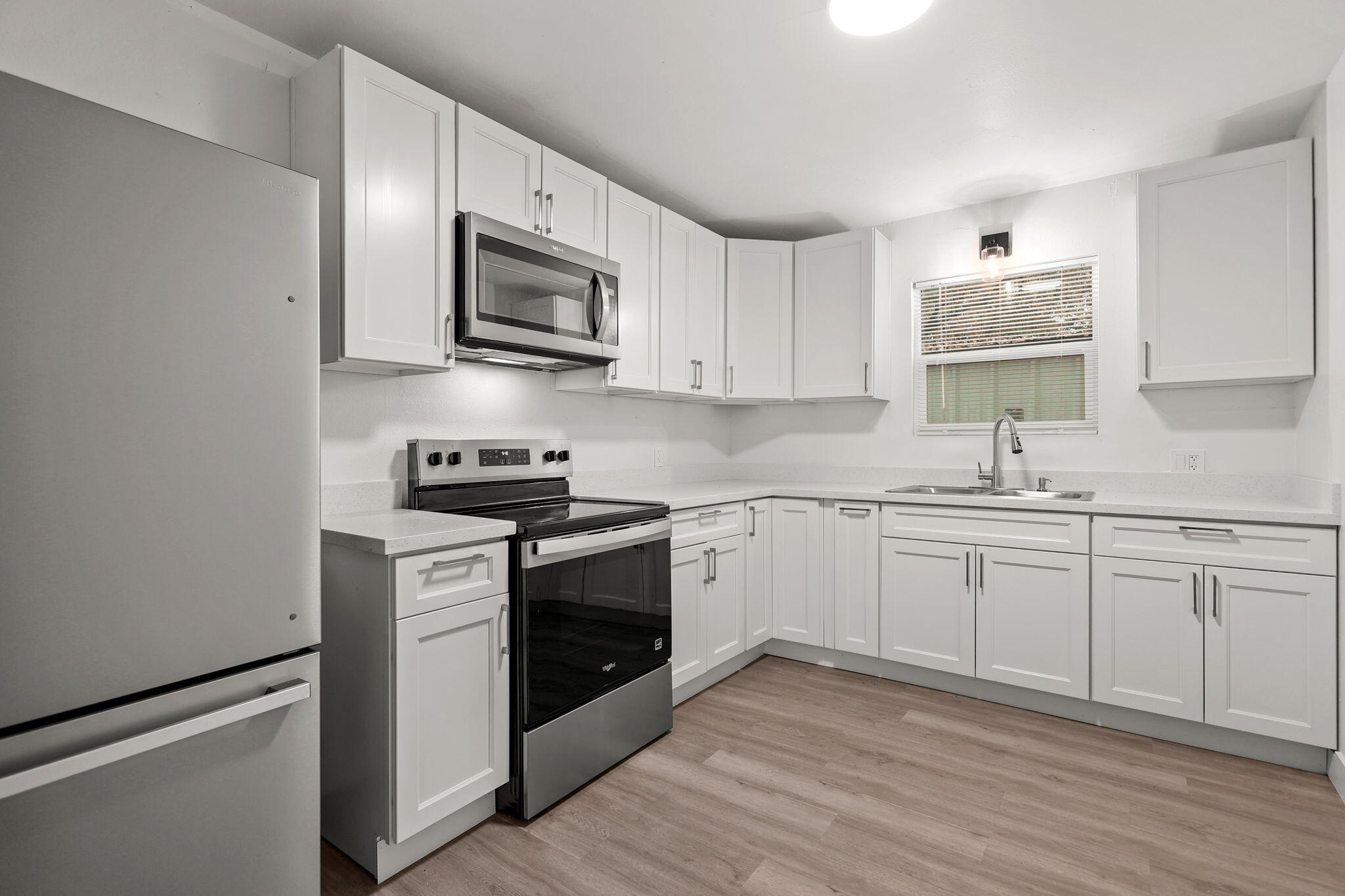 3200 Franklin Street Anderson, CA 96007 - Photo 8 of 35 a kitchen with cabinets stainless steel appliances and sink
