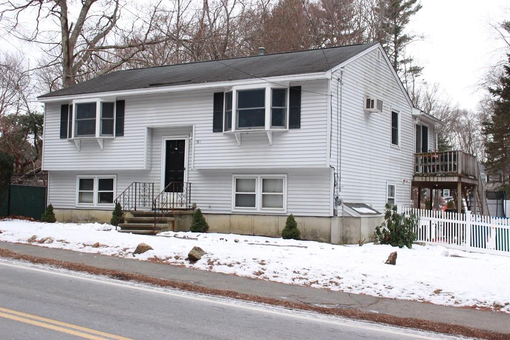 184 Baldwin Road Billerica, MA 01821 - Photo 1 of 17 a view of a house with snow on the road