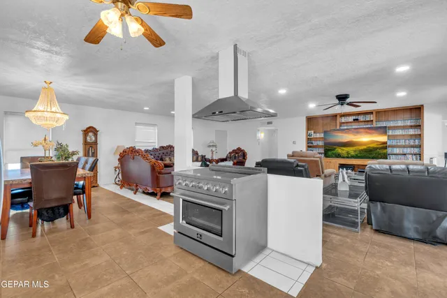 a view of a livingroom with furniture and a window