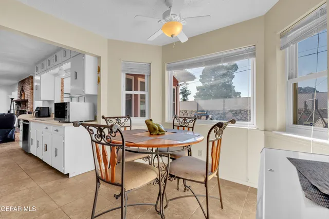 a view of a livingroom with furniture and a flat screen tv