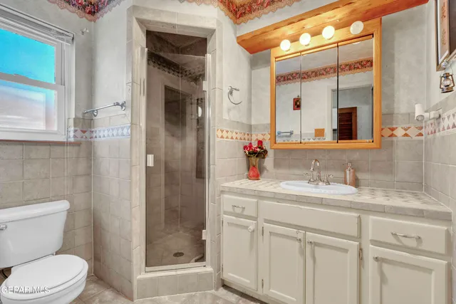 an aerial view of a city with lots of residential buildings