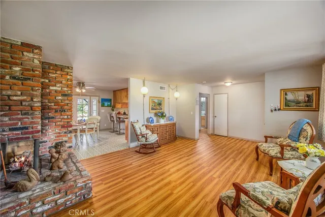 a bedroom with a bed and glass windows
