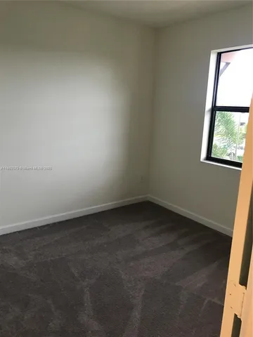 an empty room with closet