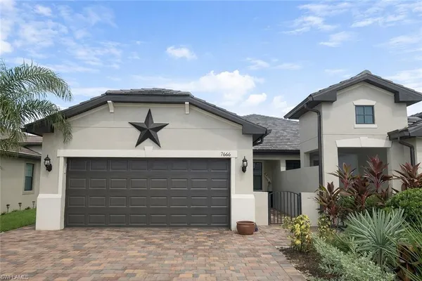 $575,000 | 7666 Jacaranda Lane, Naples, FL 34114