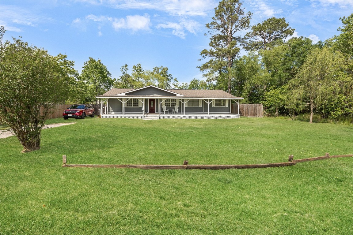 a view of a house with a big yard