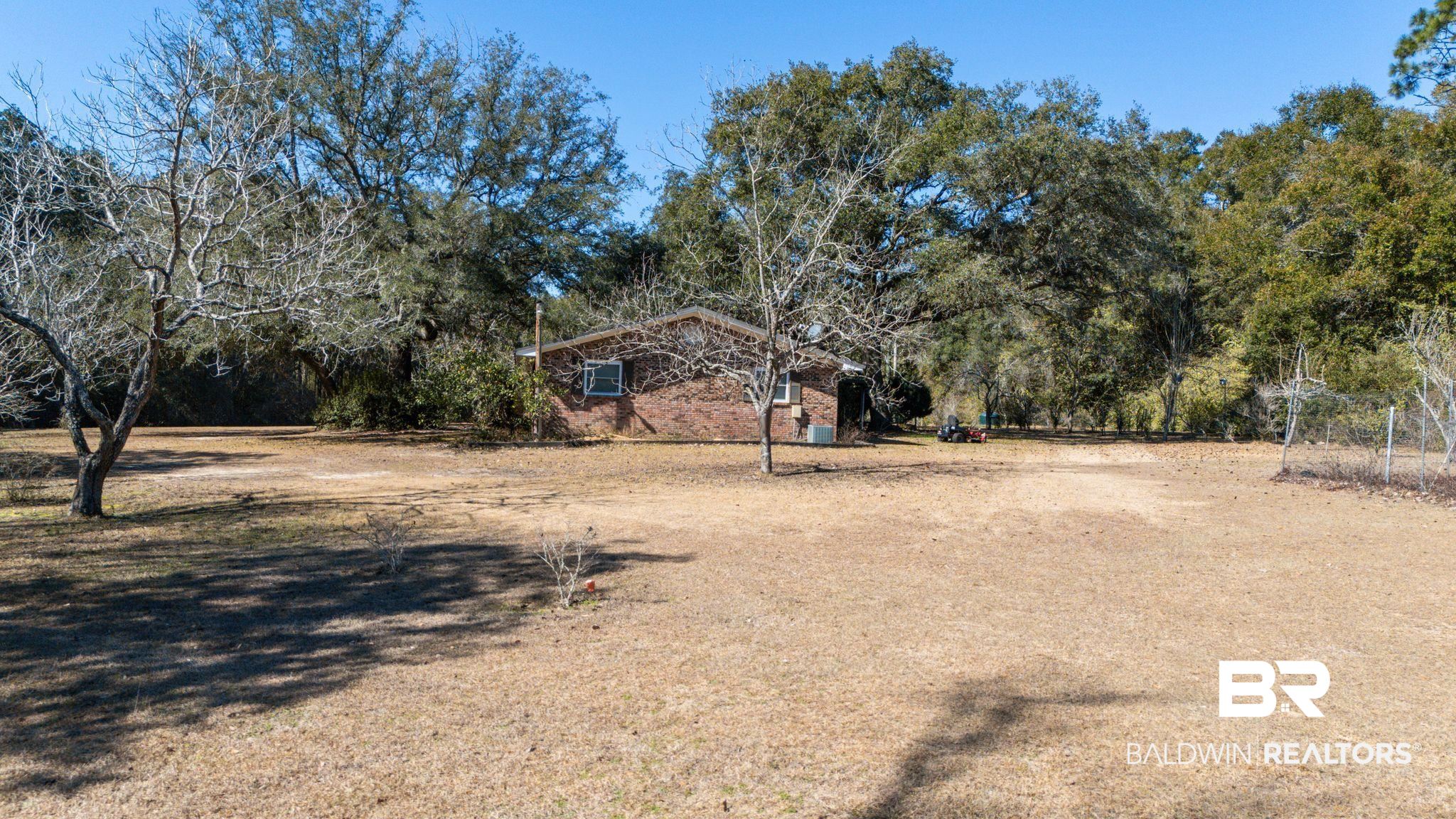 32989 Antietam Road Lillian, AL 36549 - Photo 41 of 56 View of yard featuring view of wooded area