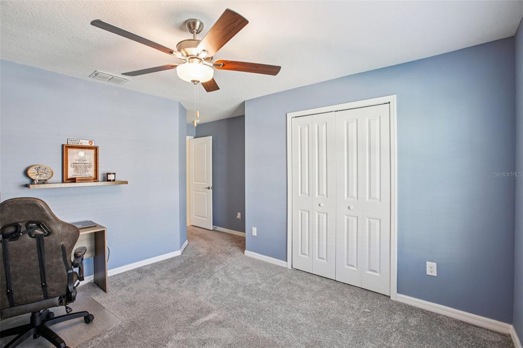 22162 Nebula Way Land O Lakes, FL 34637 - Photo 29 of 44 a view of workspace with a ceiling fan
