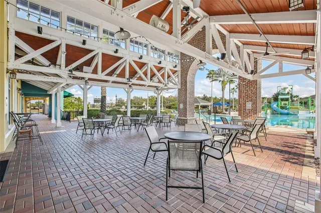 a building with outdoor space and lake view