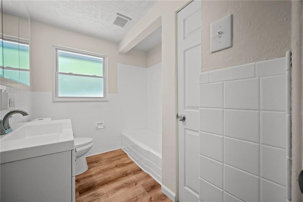 271 Forest Grove Road Coraopolis, PA 15108 - Photo 26 of 40 a bathroom with a sink and a shower