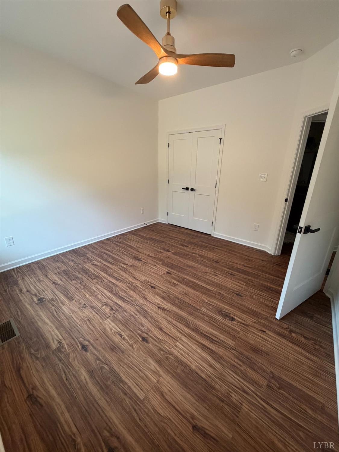 405 Hixburg Road Pamplin, VA 23958 - Photo 50 of 73 a view of empty room with wooden floor