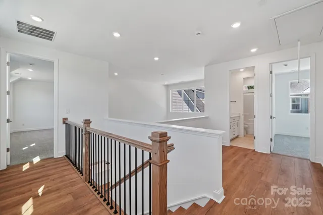 a view of a hallway with closet and entryway