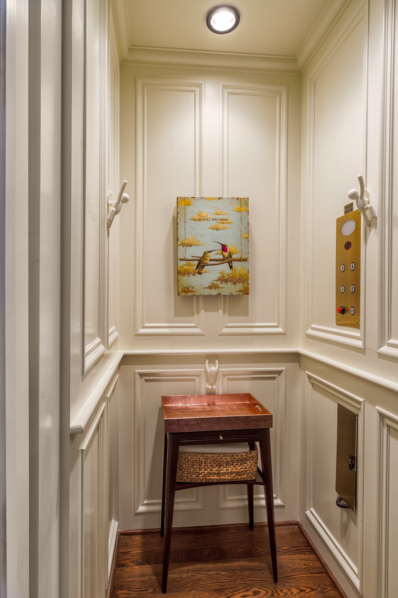 116 Church Street Franklin, TN 37064 - Photo 17 of 34 a view of a hallway with wooden floor and cabinet