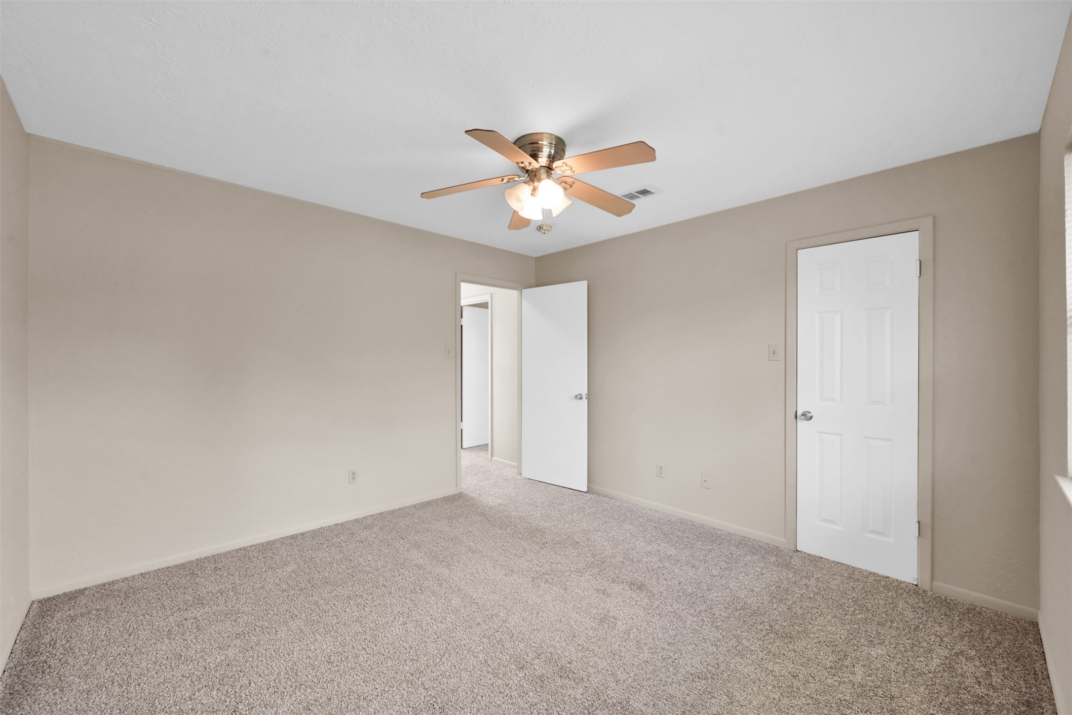 1603 Hazelwood Street, Unit B Conroe, TX 77301 - Photo 10 of 18 a view of an empty room