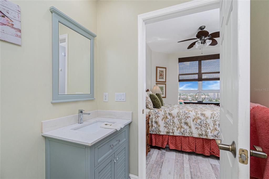 3313 Sunset Key Circle, Unit 701 Punta Gorda, FL 33955 - Photo 29 of 57 a bedroom with a bed and a night stand