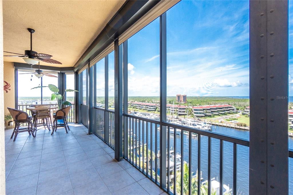 3313 Sunset Key Circle, Unit 701 Punta Gorda, FL 33955 - Photo 52 of 57 a view of a city from a balcony with furniture