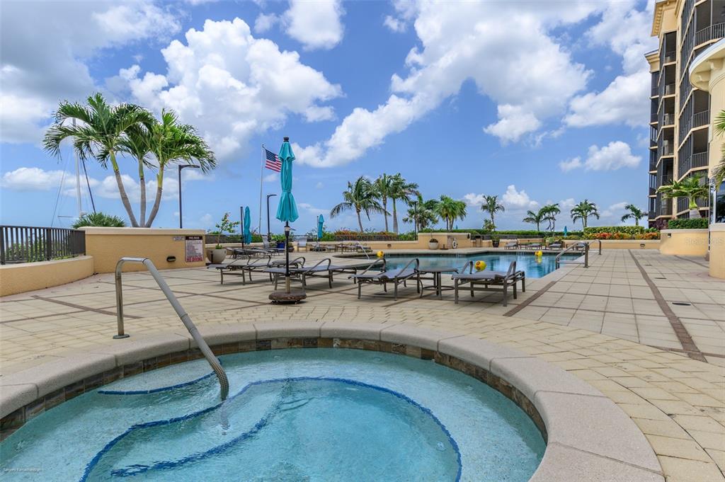 3313 Sunset Key Circle, Unit 701 Punta Gorda, FL 33955 - Photo 56 of 57 a view of swimming pool with outdoor seating and city view