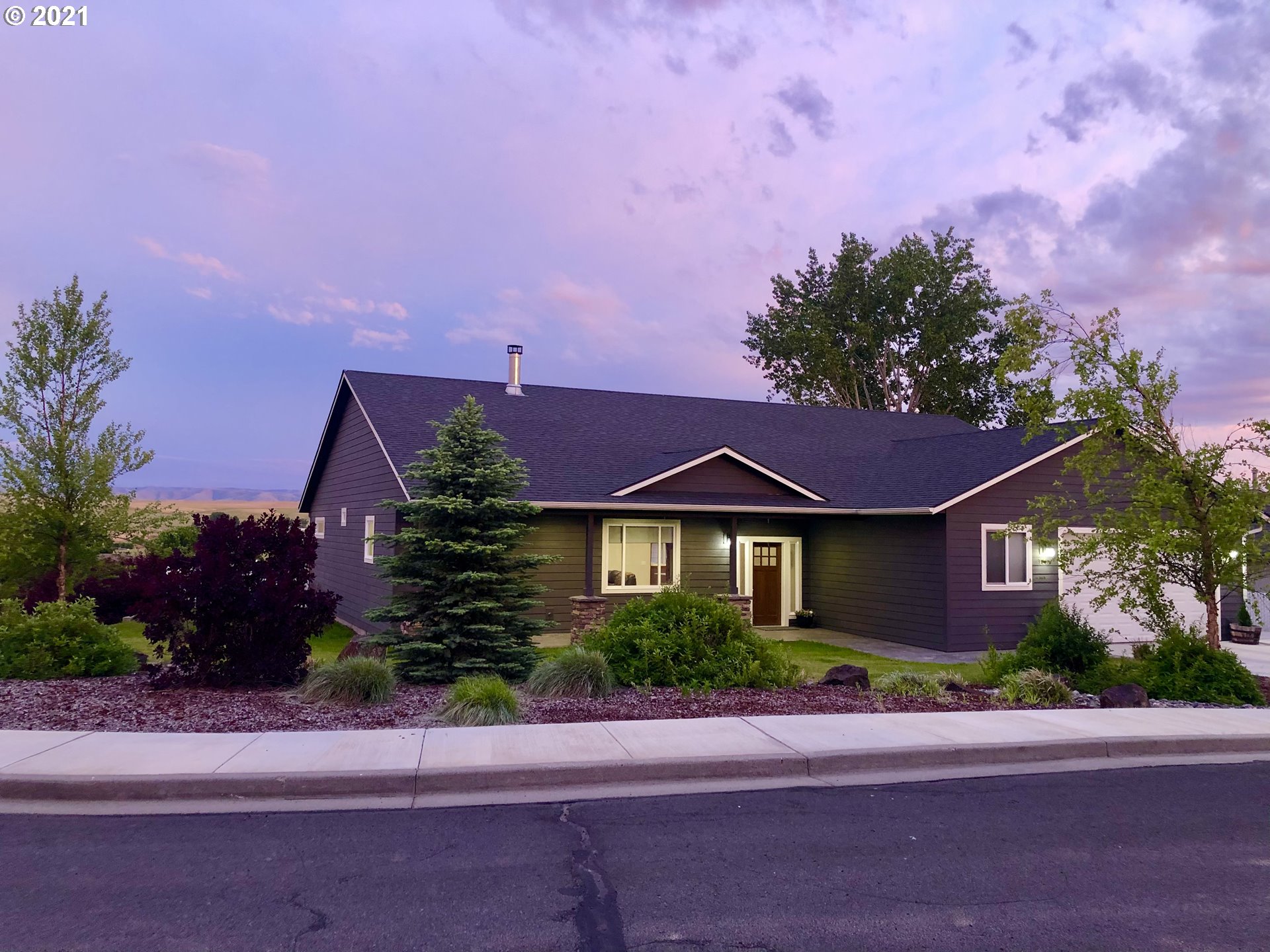 1304 Alpha Court Pendleton, OR 97801 - Photo 1 of 32 front view of a house with a garden