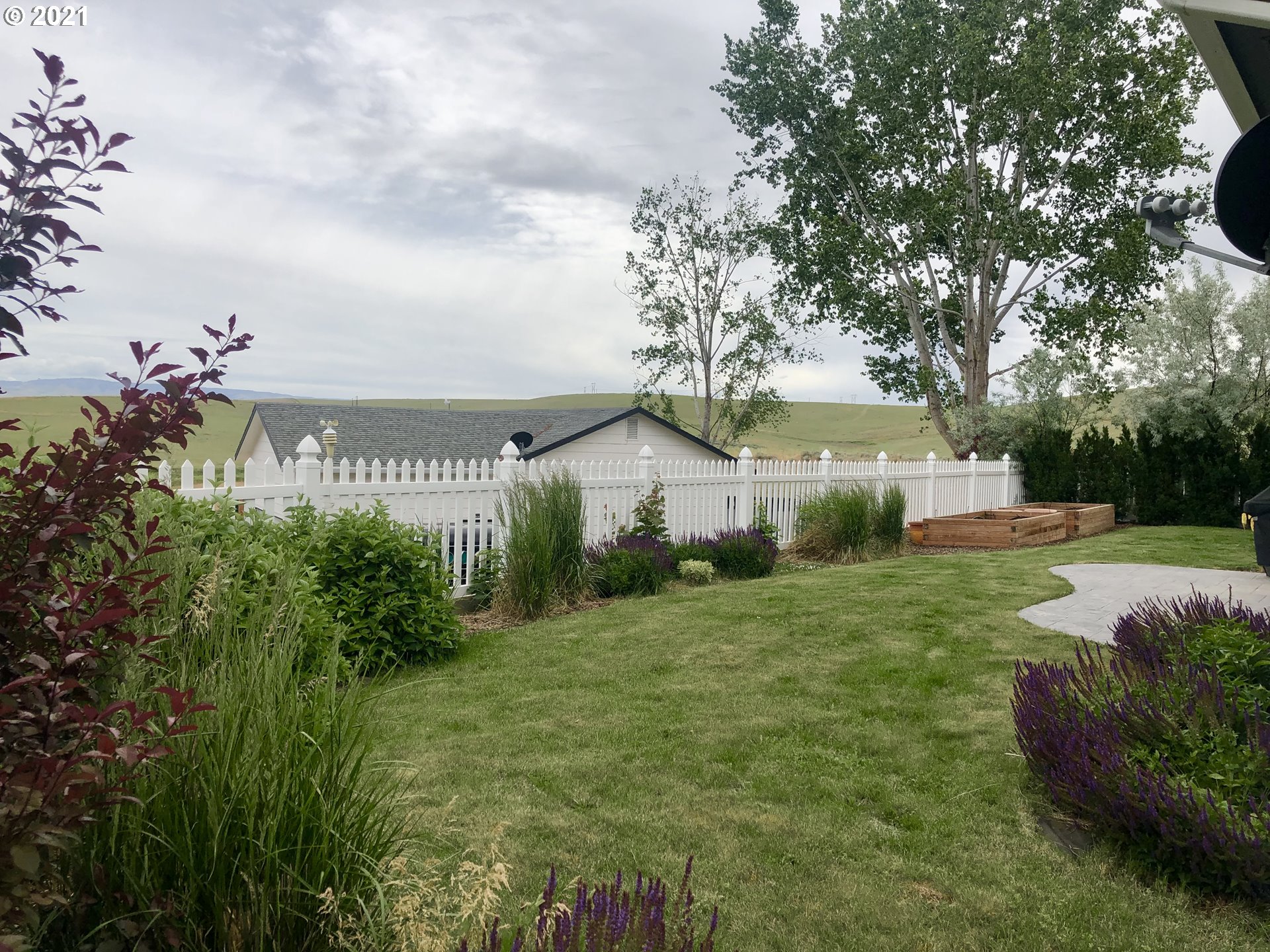 1304 Alpha Court Pendleton, OR 97801 - Photo 31 of 32 a front view of a house with garden