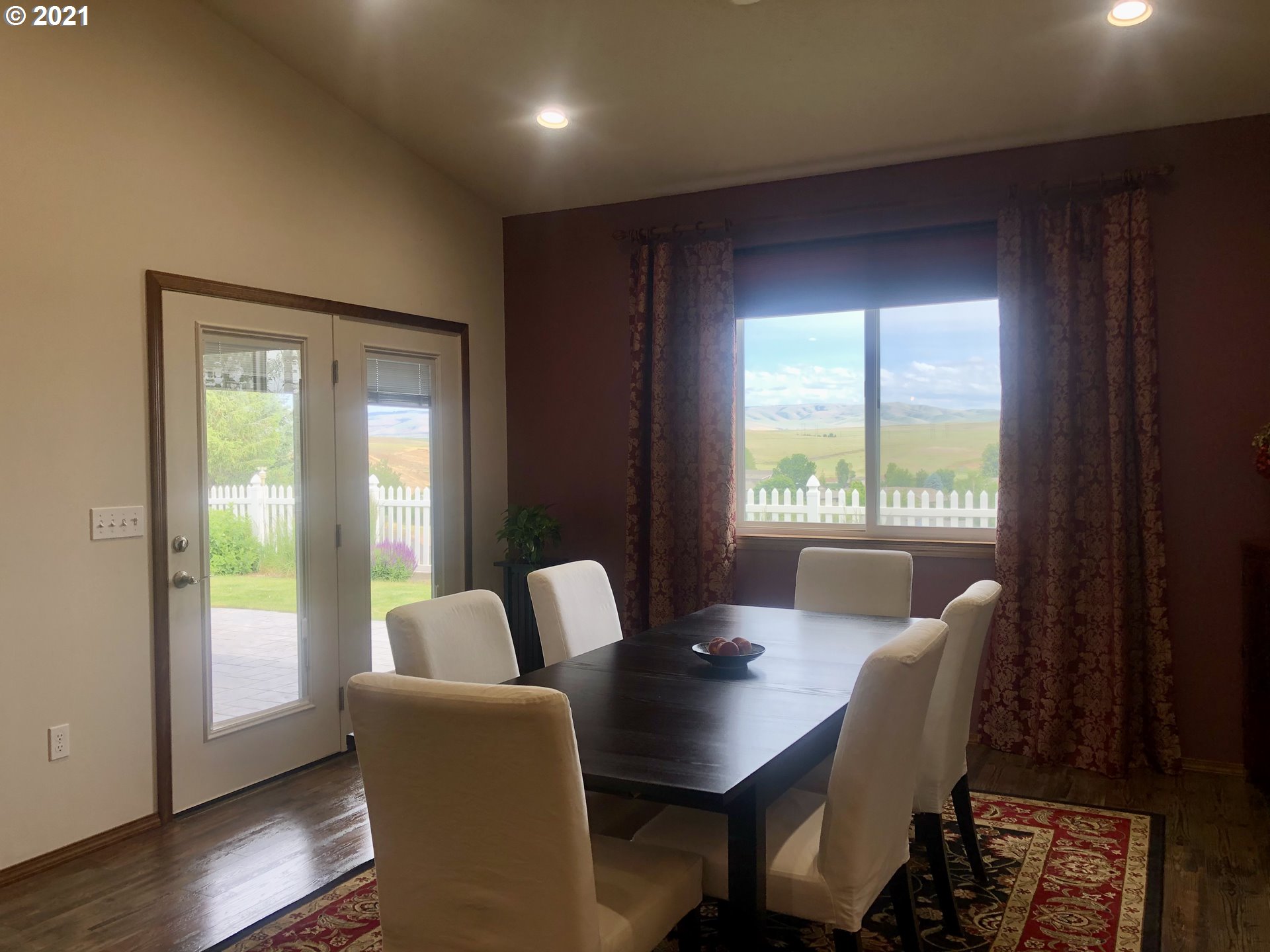 1304 Alpha Court Pendleton, OR 97801 - Photo 8 of 32 a dining room with furniture and wooden floor