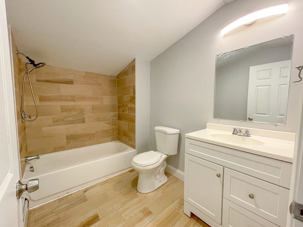 51 School Street North Barre, MA 01005 - Photo 12 of 35 a bathroom with a sink toilet and shower